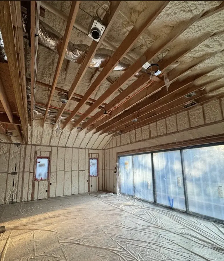 Interior walls and ceiling insulated with spray foam during new construction in Lacombe